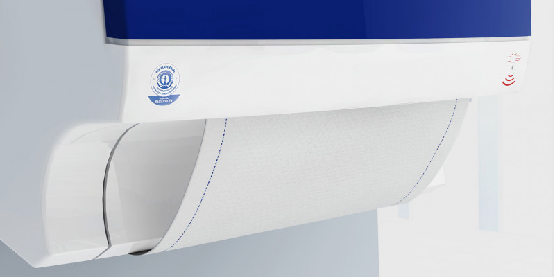 Fabric towel roll in towel dispenser with the Blue Angel ecolabel