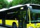 a black and yellow bus of the BVG with inscription "CO2"